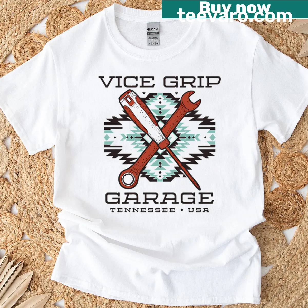 Automotive-themed T-shirt with a bold Vice Grip Garage emblem — on a men's t-shirt