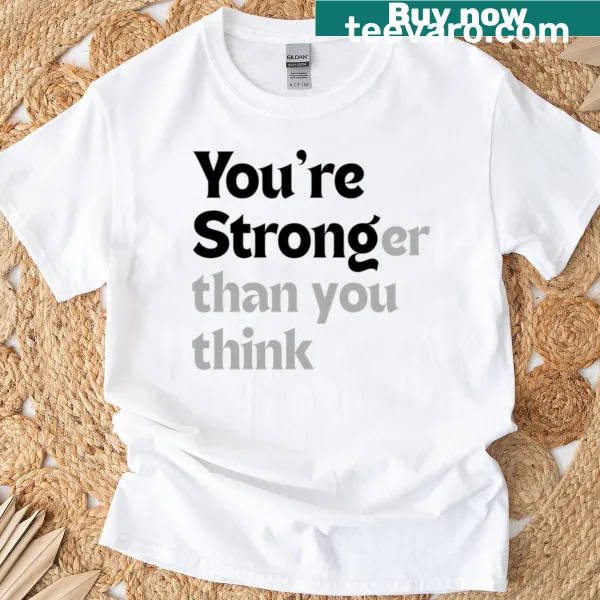 Motivational T-shirt with empowering message about strength.