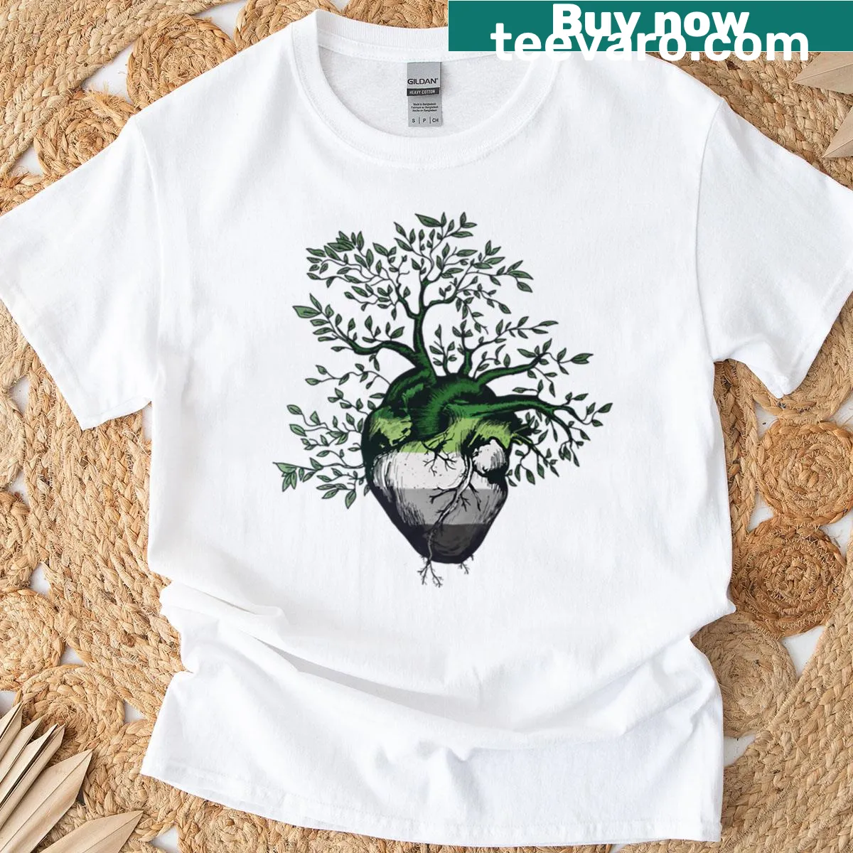 Illustrated T-shirt featuring a heart-shaped tree of life design. — on a men's t-shirt
