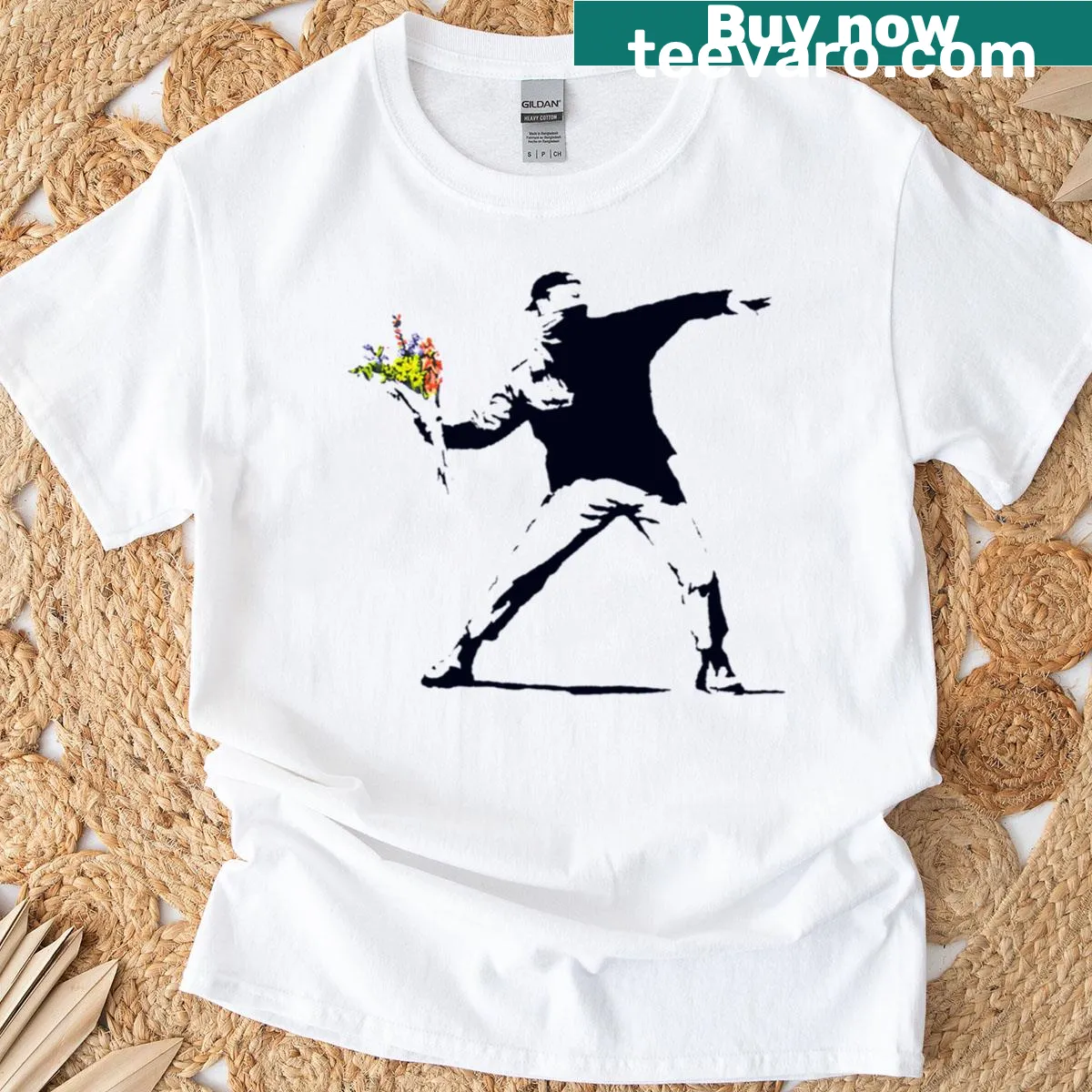 Banksy-inspired graphic of a figure throwing a bouquet on t-shirt — on a men's t-shirt