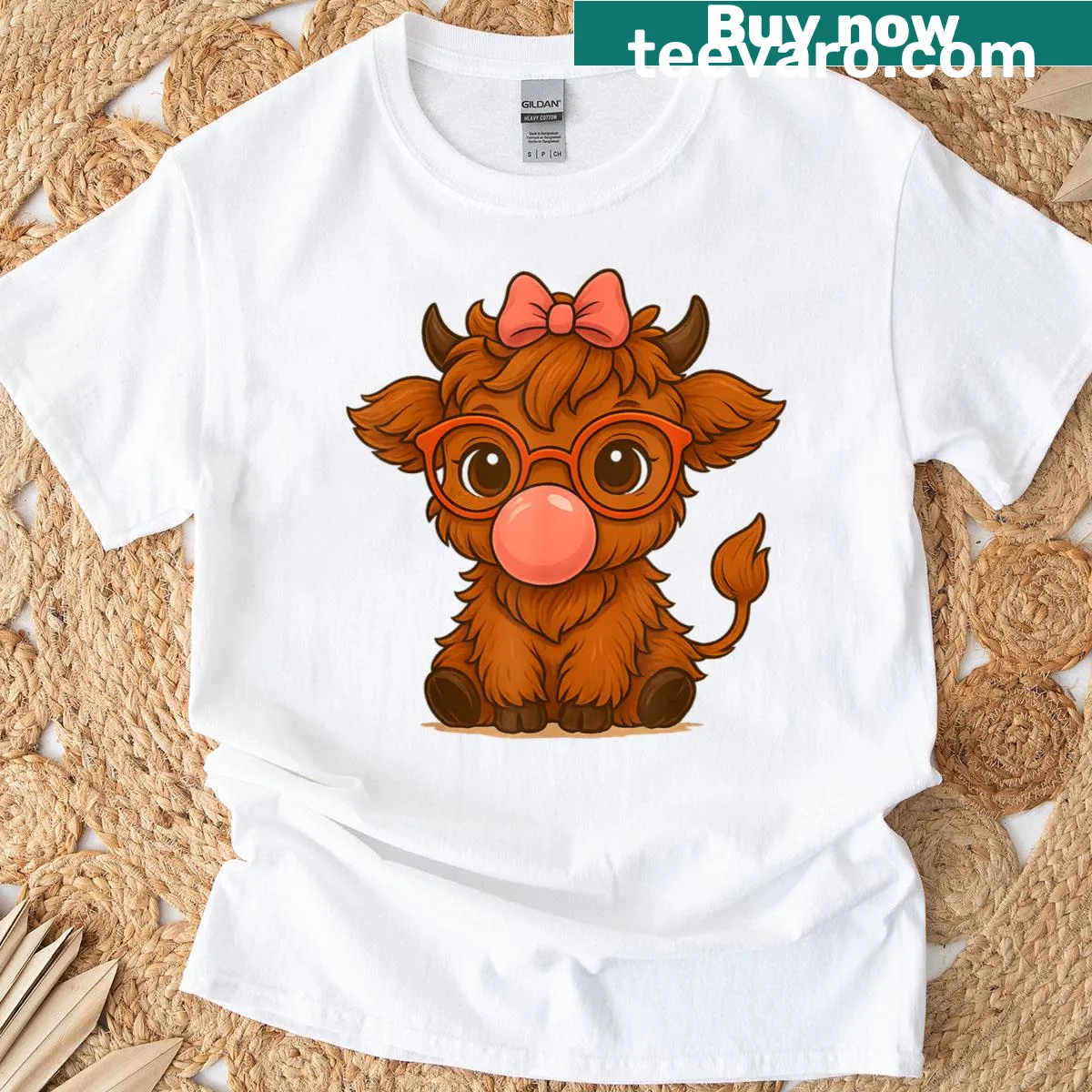 Cartoon Highland cow with bubblegum glasses and bow on T-shirt — on a men's t-shirt