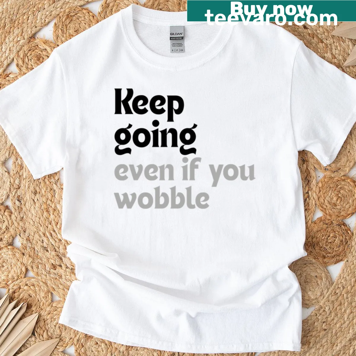 T-shirt with the phrase Keep Going Even If You Wobble — on a men's t-shirt