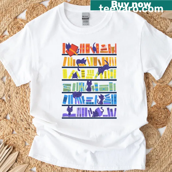 Illustrated kittens playing among books on a Library Kittens t-shirt.