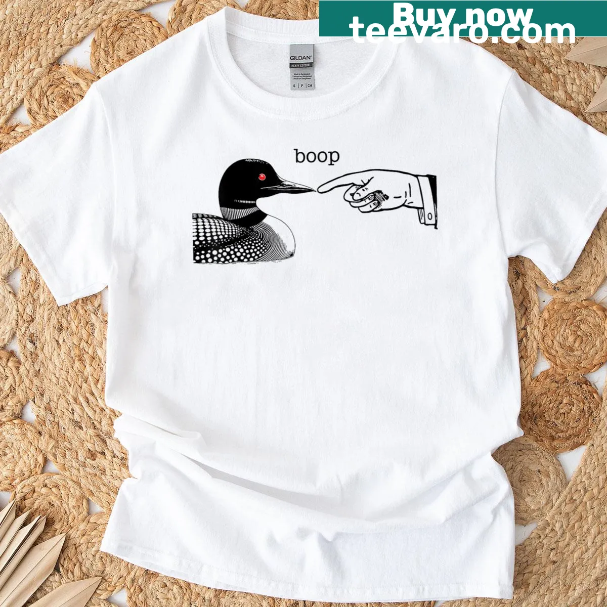 Cartoon loon and human hand on a t-shirt for loon lovers. — on a men's t-shirt