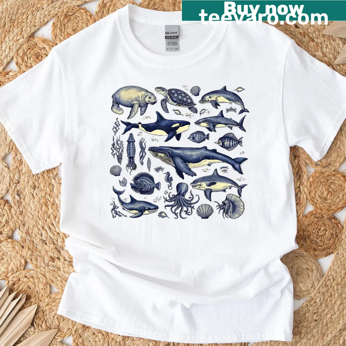 Vintage T-shirt featuring ocean life with whales and dolphins — on a men's t-shirt