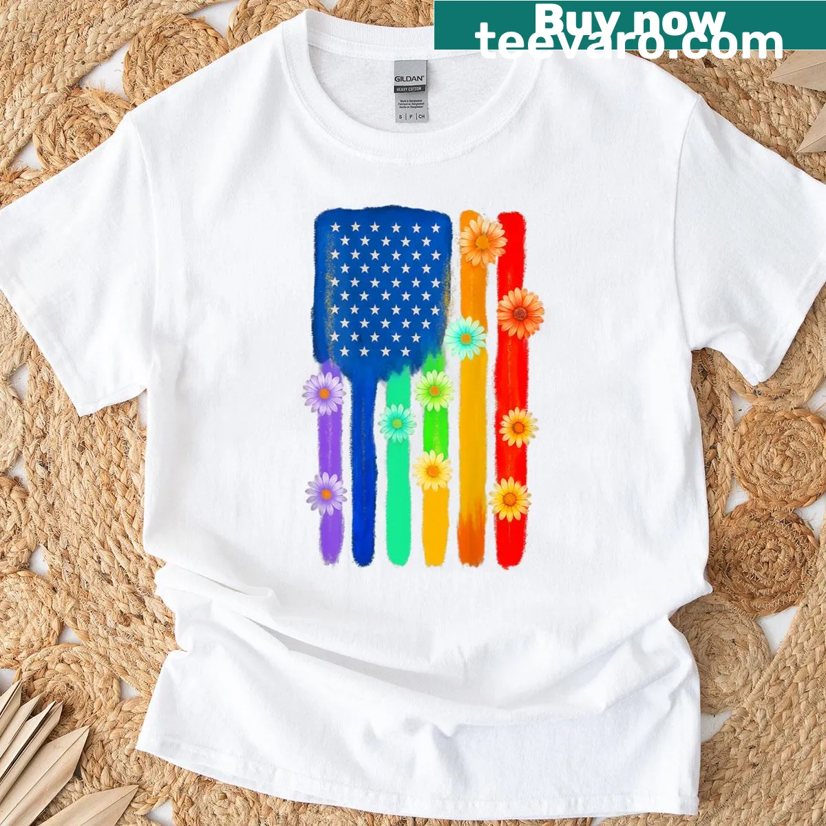 Floral rainbow pride flag graphic on the back of a T-shirt — on a men's t-shirt
