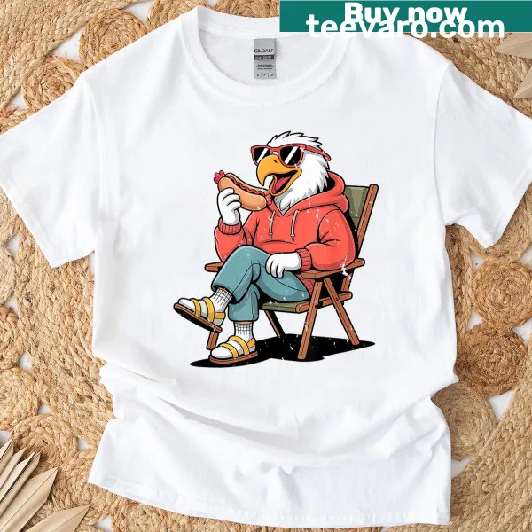 Cartoon eagle graphic holding a hot dog for 4th of July
