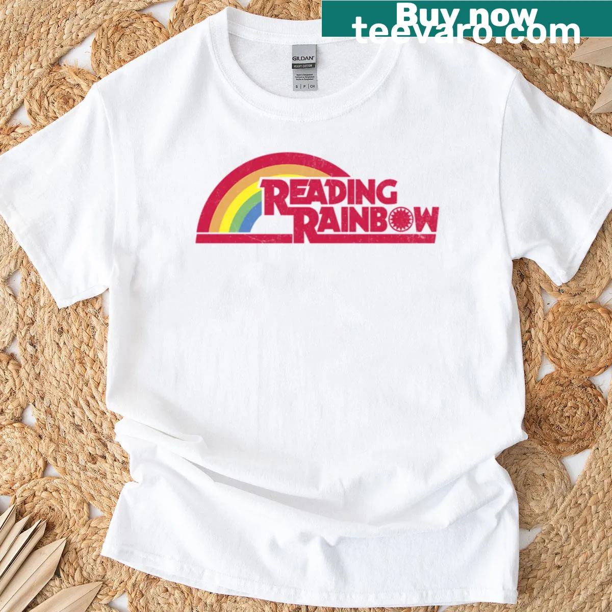 Cheerful text graphic saying 'Reading Rainbow' on a fun tee. — on a men's t-shirt