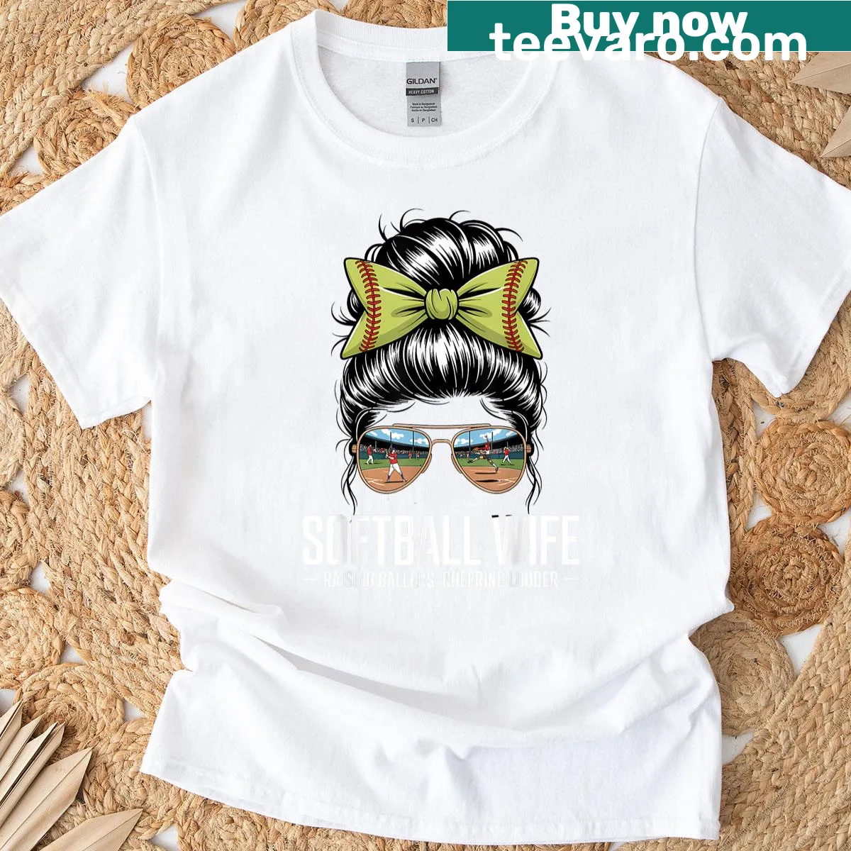 Illustration of a woman with messy bun and sunglasses, proud softball wife — on a men's t-shirt