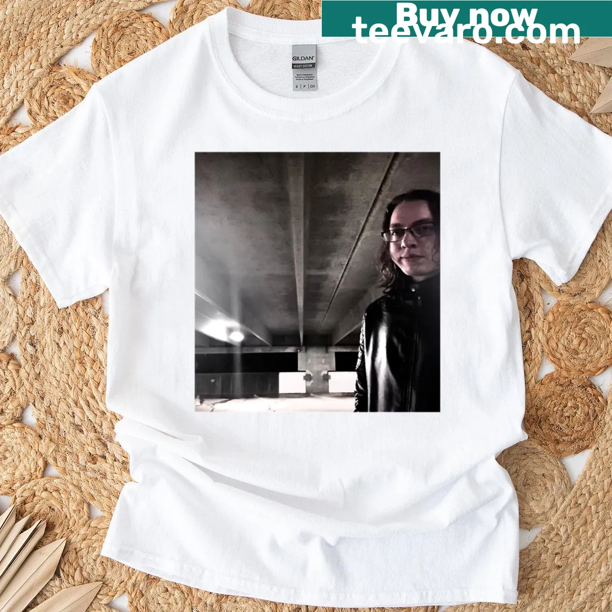Chubby face smirk graphic on photography-themed T-shirt — on a men's t-shirt