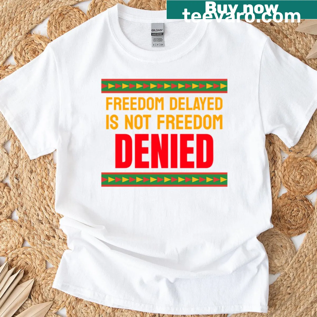 Oversized Juneteenth T-shirt with the word Strong in bold text — on a men's t-shirt