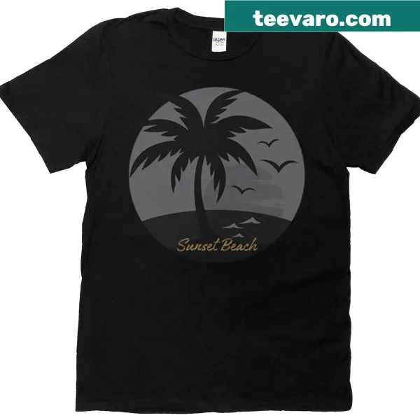 Graphic tee featuring a sunset beach scene with palm trees