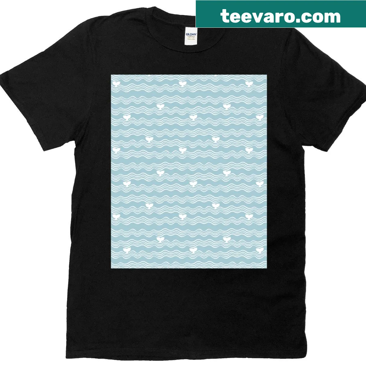 T-shirt with graphic of swimming whales in the ocean — on a men's t-shirt