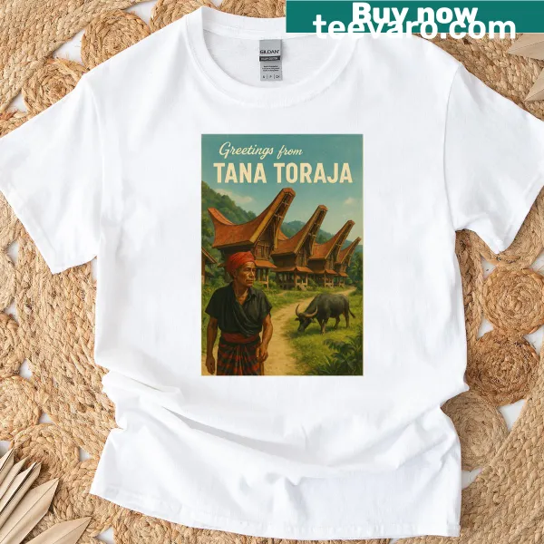 Oversized T-shirt featuring traditional Tana Toraja homes and culture.