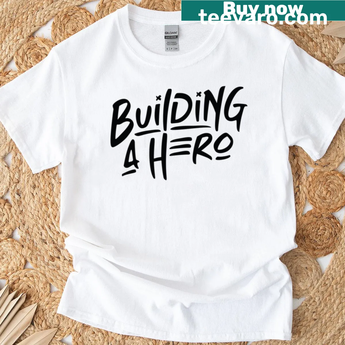 Basic black oversized T-shirt with the phrase Building A Hero — on a men's t-shirt