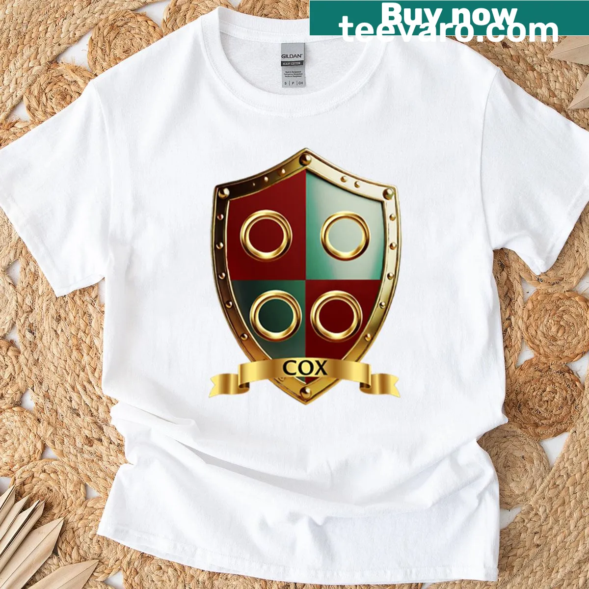 Cox Family Shield t-shirt with quartered shield and golden rings design — on a men's t-shirt