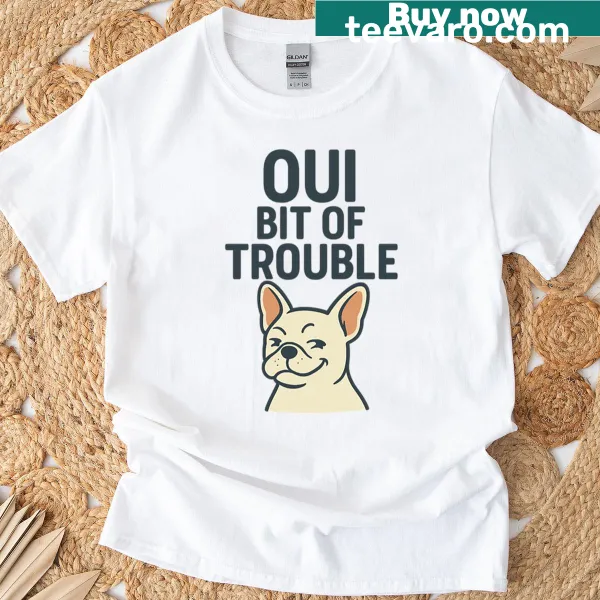 T-shirt with the phrase 'Oui Bit Of Trouble' in hand-lettered design