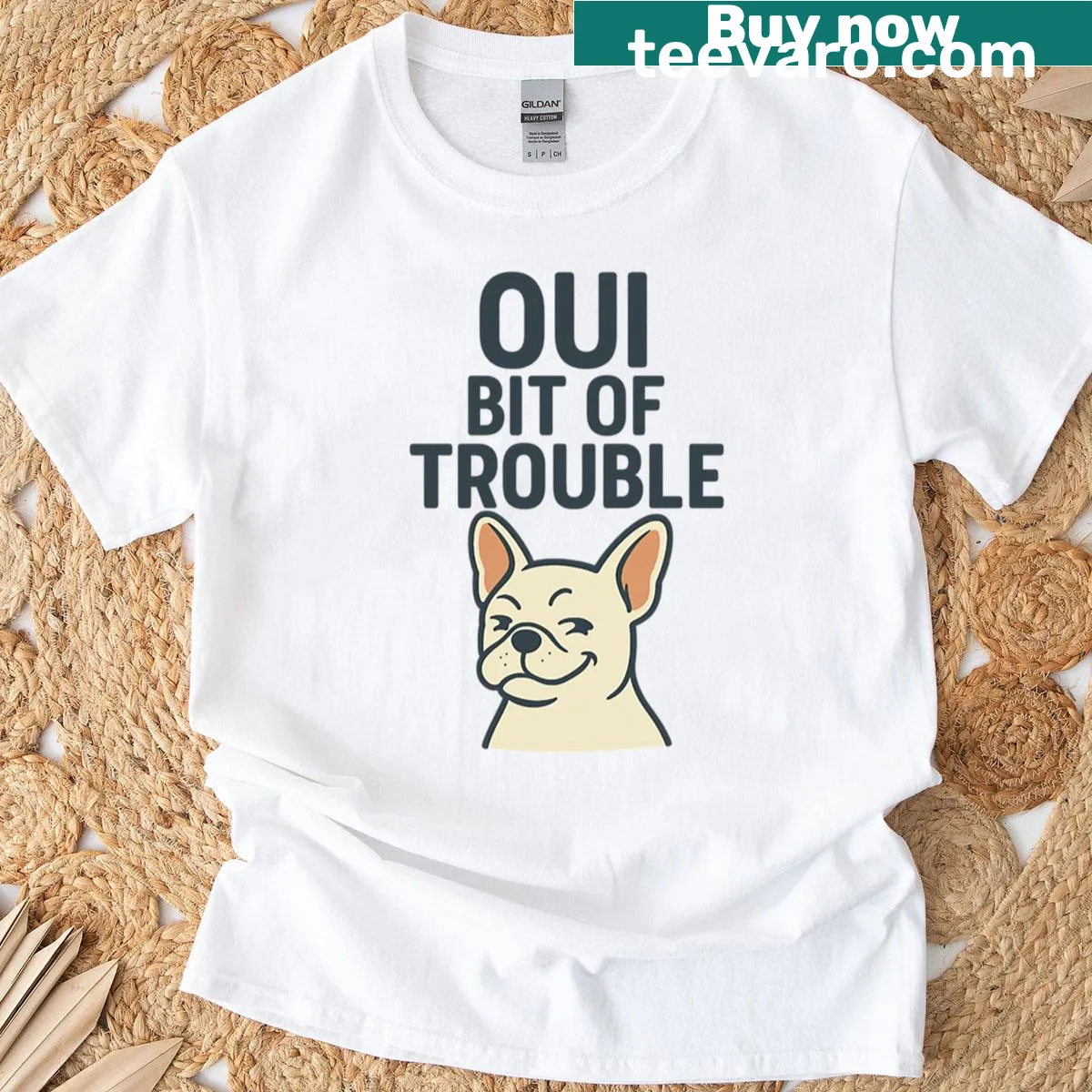 T-shirt with the phrase 'Oui Bit Of Trouble' in hand-lettered design — on a men's t-shirt