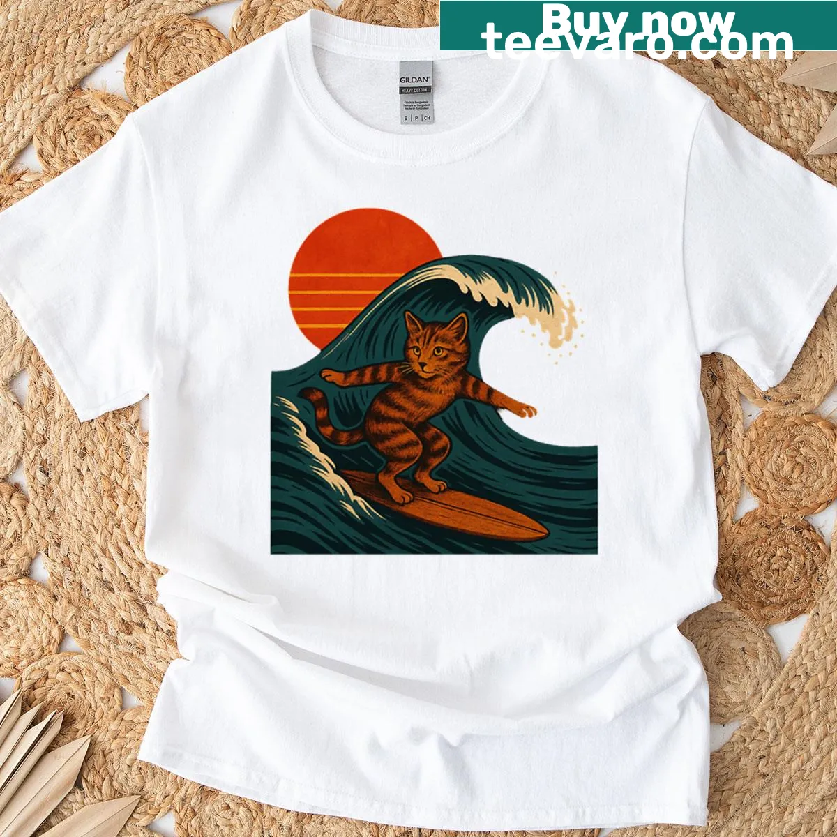 Vintage surfing cat t-shirt featuring sunset wave art — on a men's t-shirt