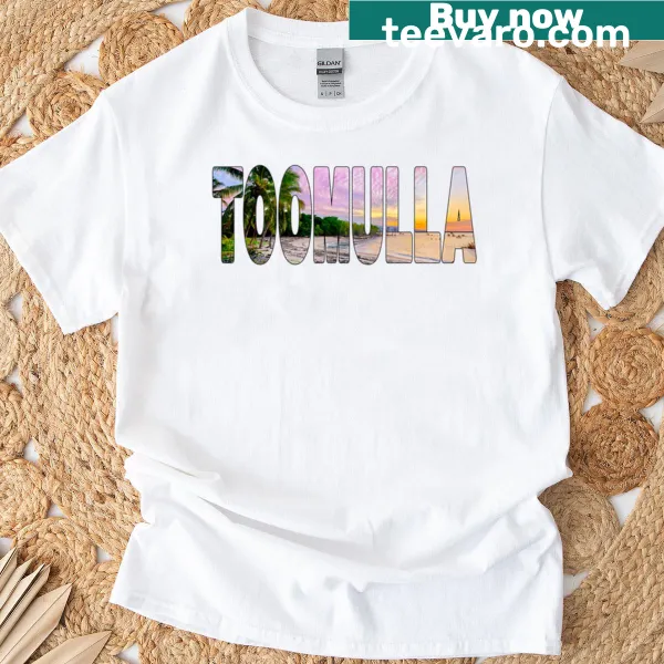 T-shirt featuring palm trees and sunset beach design