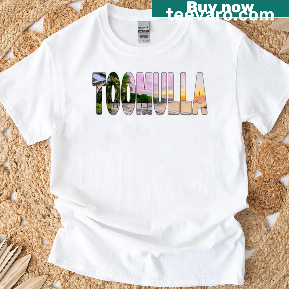 T-shirt featuring palm trees and sunset beach design — on a men's t-shirt