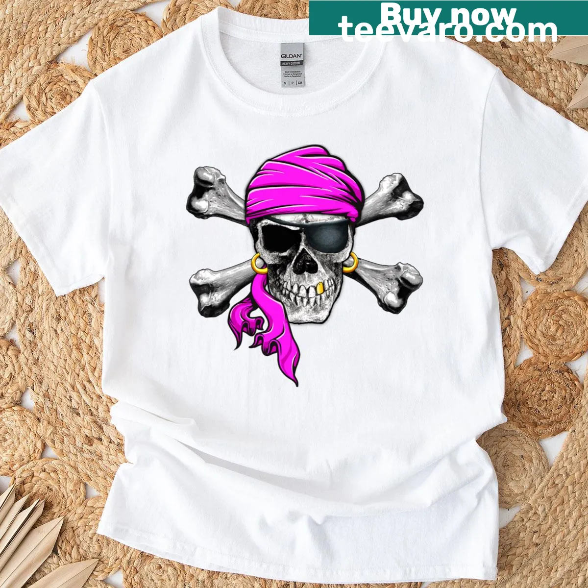 Pirate-themed t-shirt featuring skull and bones logo with pink bandana — on a men's t-shirt