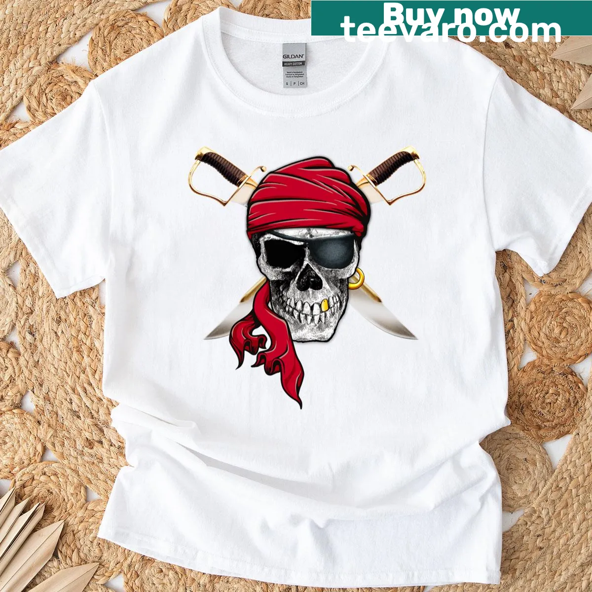 Pirate-themed t-shirt with skull, swords, and red bandana illustration — on a men's t-shirt