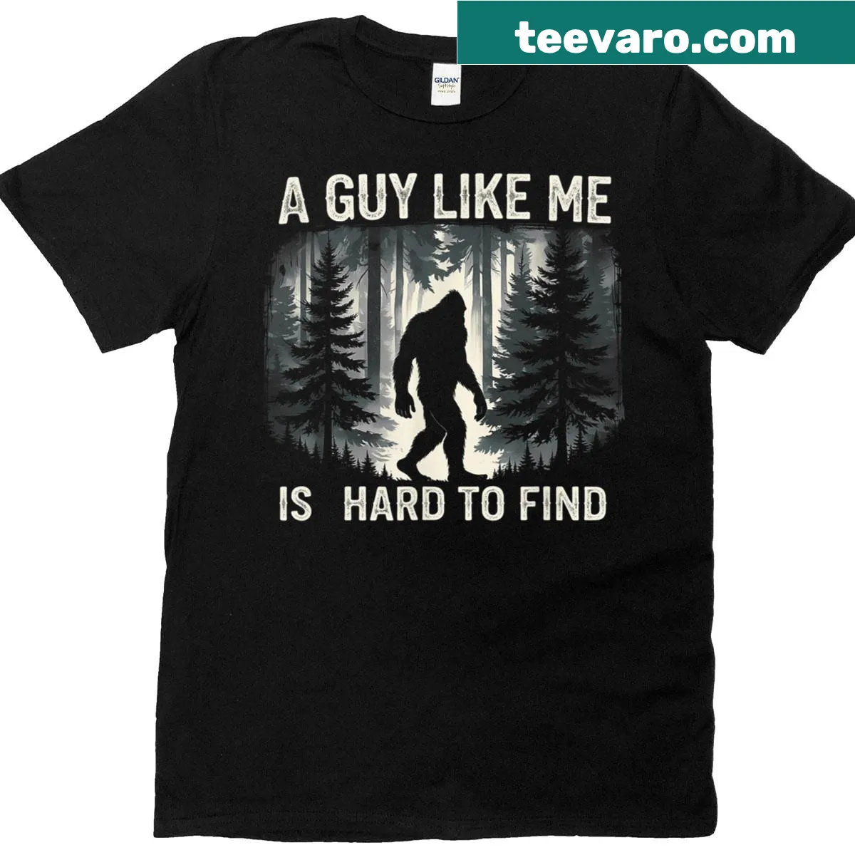 Playful Bigfoot graphic T-shirt with the phrase 'A Guy Like Me Is Hard To Forest Find' — on a men's t-shirt
