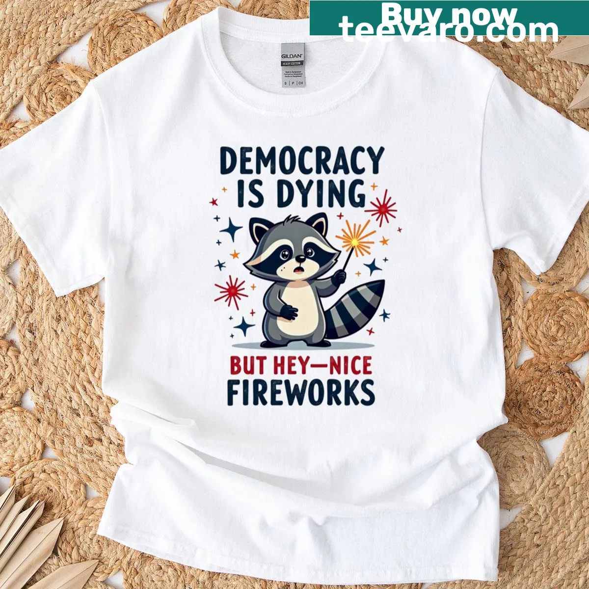 T-shirt featuring a humorous raccoon with fireworks for Fourth of July. — on a men's t-shirt