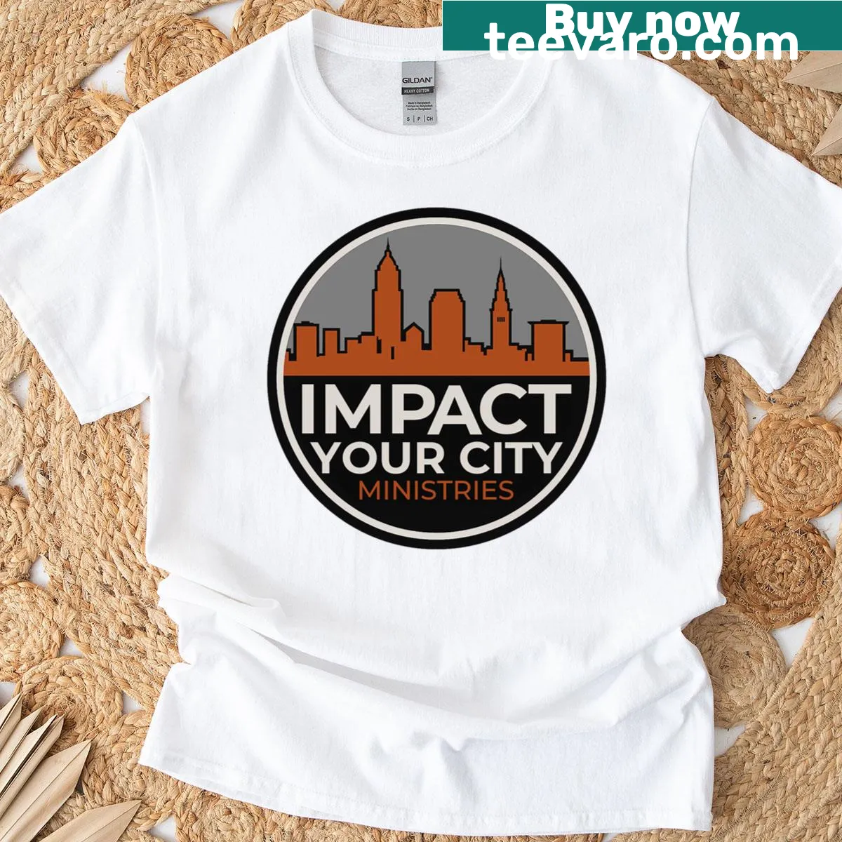 Cleveland skyline church ministries logo t-shirt — on a men's t-shirt