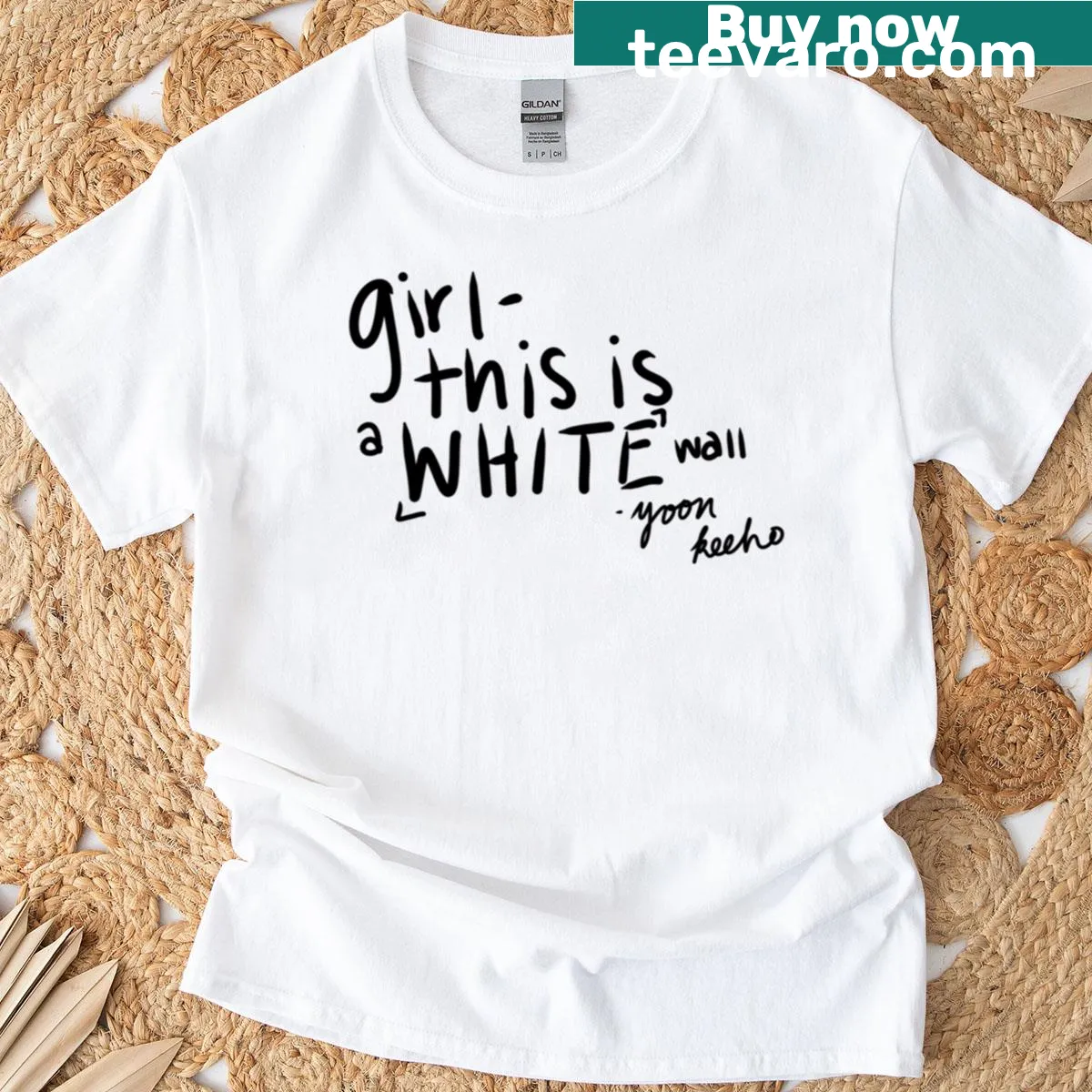 Minimalist typography design on oversized T-shirt — on a men's t-shirt