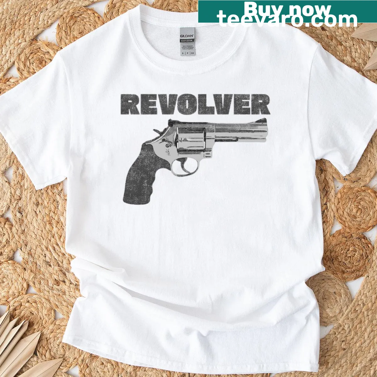 Illustrative graphic of a revolver on a T-shirt — on a men's t-shirt