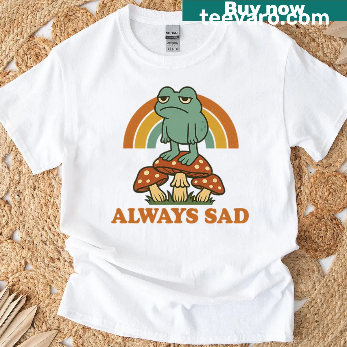 Cute T-shirt featuring a frog sitting on mushrooms — on a men's t-shirt