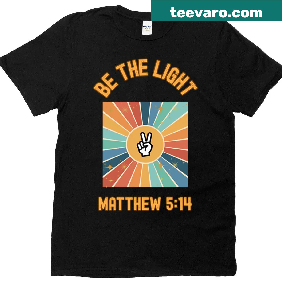 Oversized T-shirt with inspirational 'Be The Light' typography — on a men's t-shirt