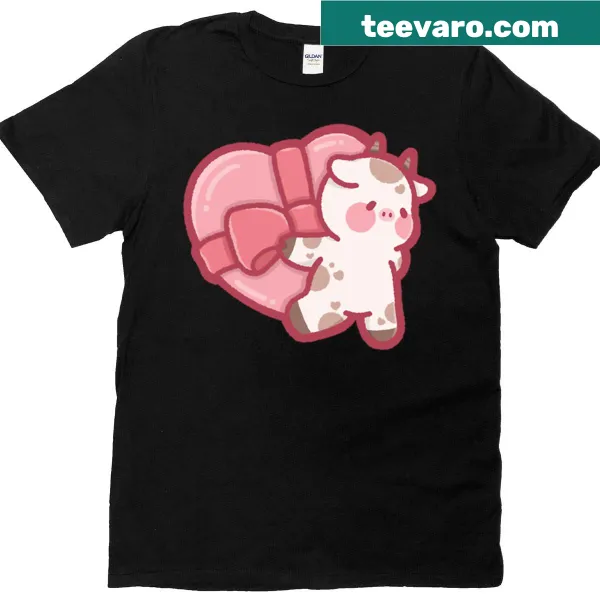 Cute cartoon cow carrying a heart-shaped gift box graphic.