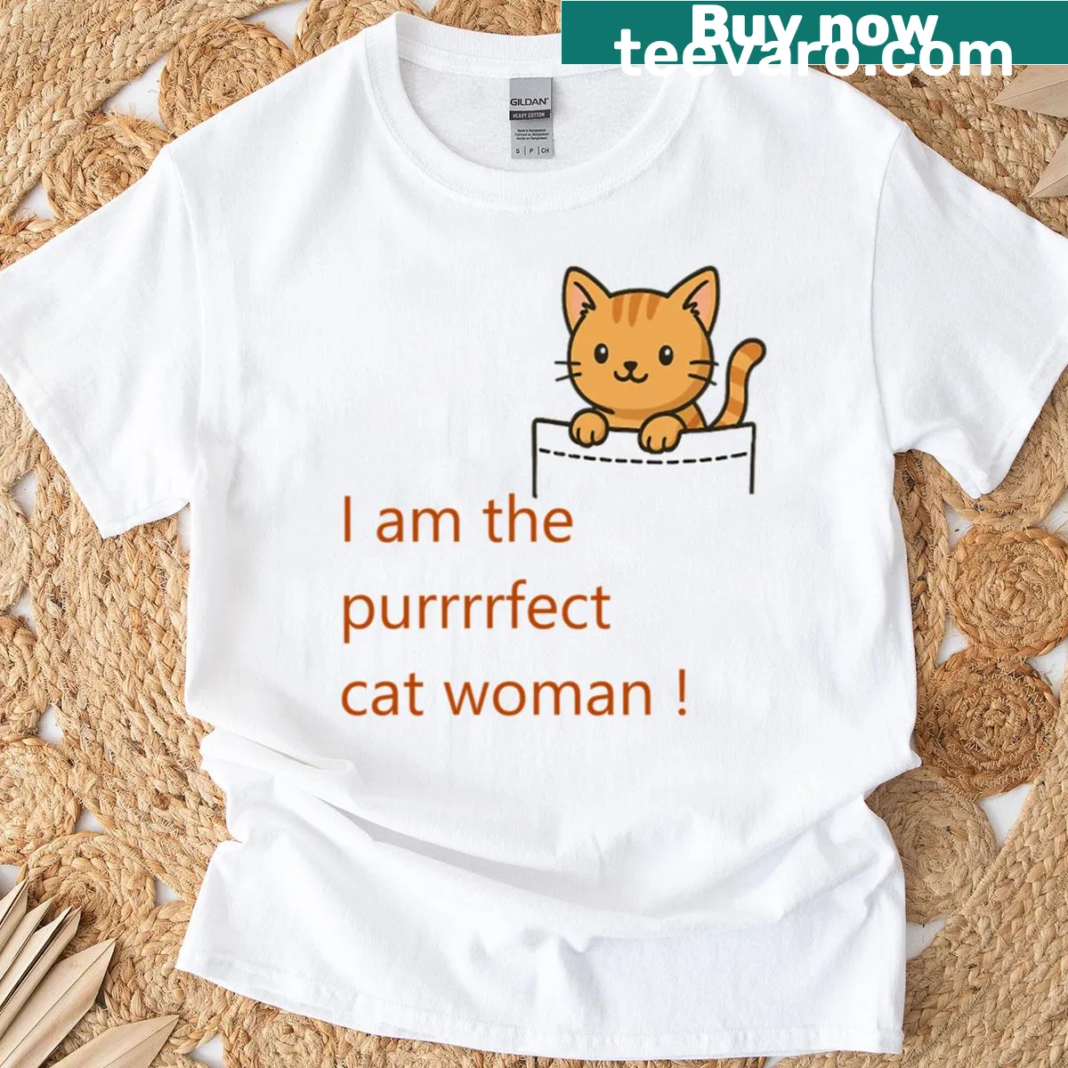 Oversized T-shirt with cute cartoon cat peeking over a fence — on a men's t-shirt