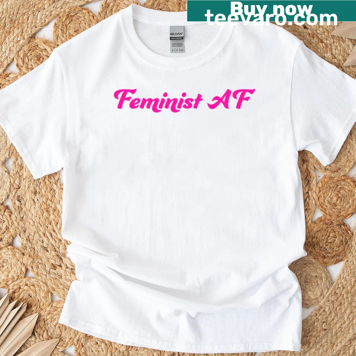 Pink oversized T-shirt with 'Feminist AF' text — on a men's t-shirt