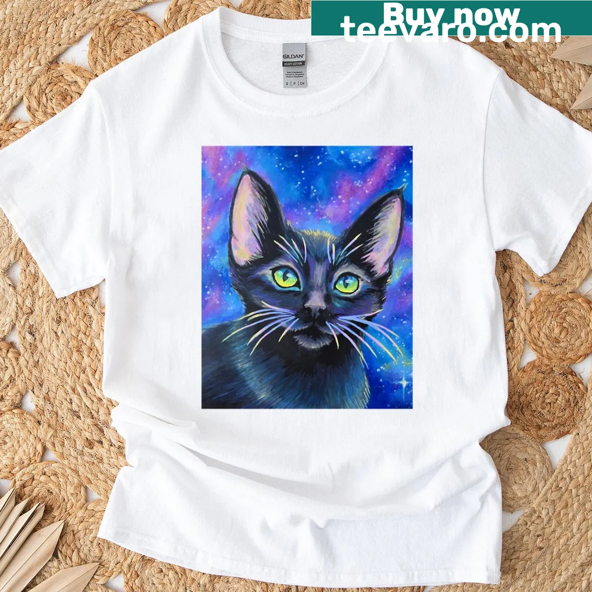 Graphic of a black kitten in a starry cosmic setting — on a men's t-shirt