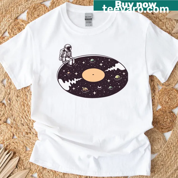 Illustrative design of musical notes among cosmic elements on a t-shirt