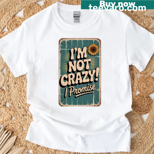 Whimsical t-shirt with a sunflower and humorous 'I'm not crazy' text
