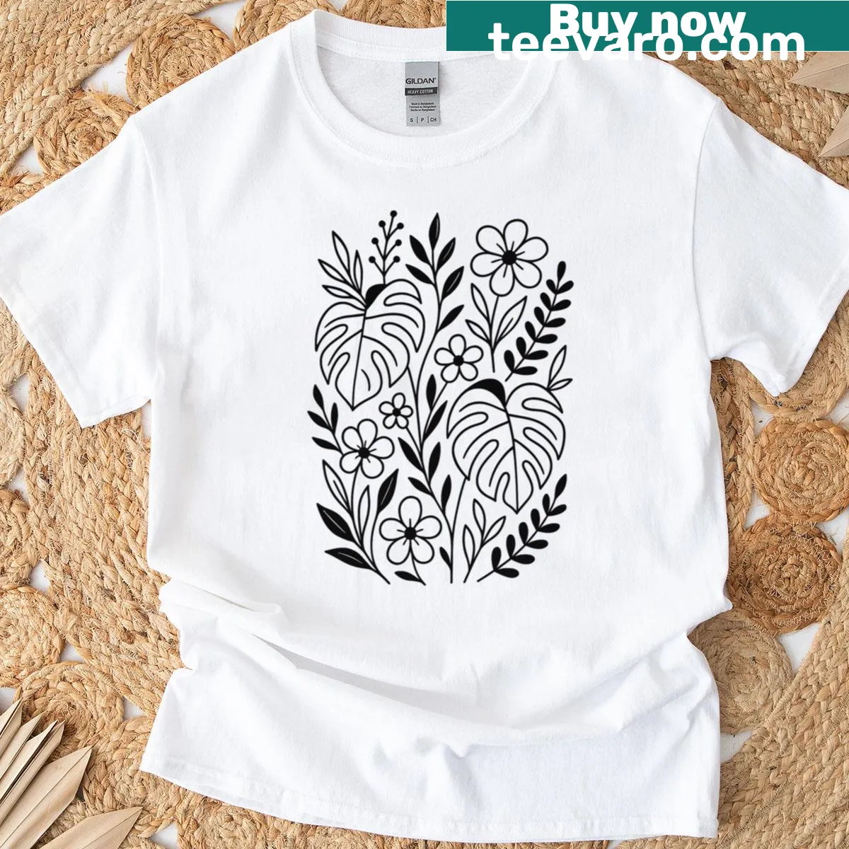 Oversized T-shirt with monstera floral line art design — on a men's t-shirt