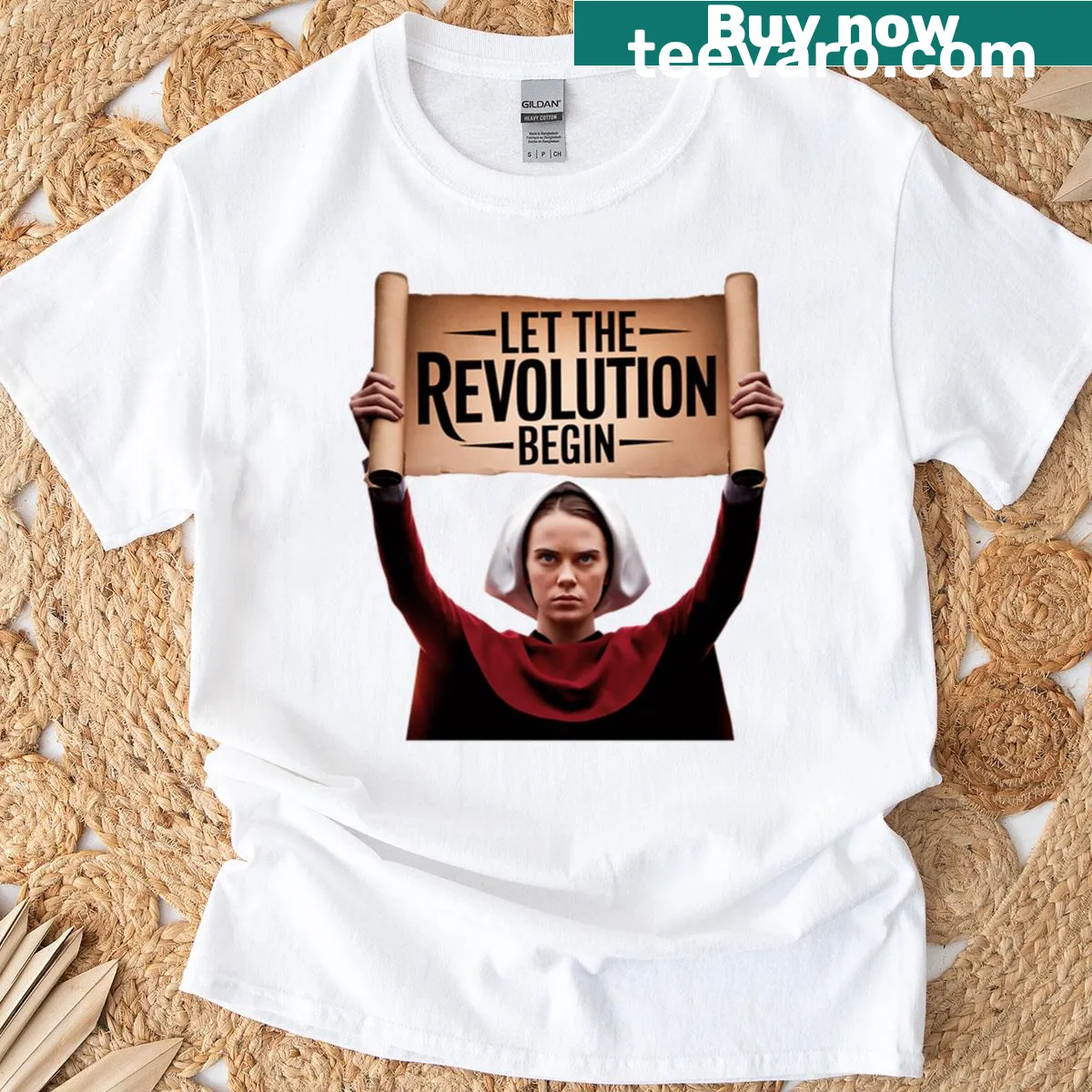 Illustrative T-shirt featuring 'Let The Revolution Begin' from The Handmaid's Tale — on a men's t-shirt