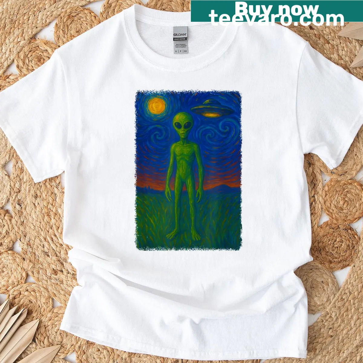 Illustrative T-shirt of aliens and UFOs against a starry night — on a men's t-shirt