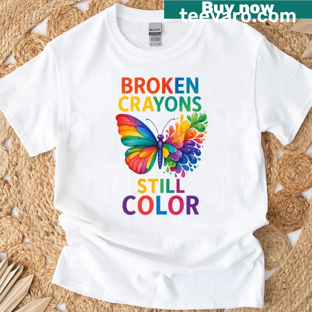 Inspirational T-shirt with butterfly and 'Broken Crayons Still Color' text — on a men's t-shirt