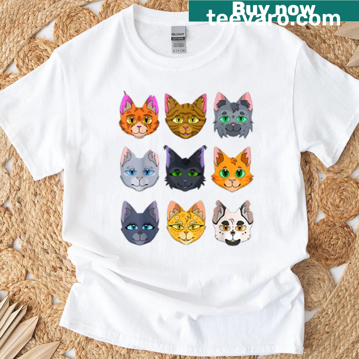 Grid of colorful cartoon cat faces on T-shirt — on a men's t-shirt