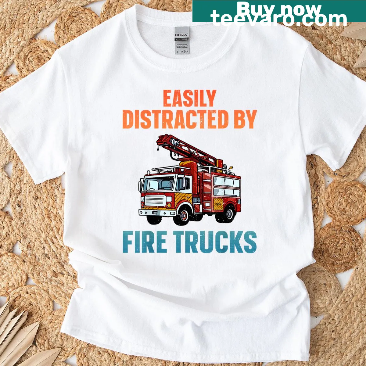 Illustrated firefighter T-shirt with a fire truck and firefighter design — on a men's t-shirt