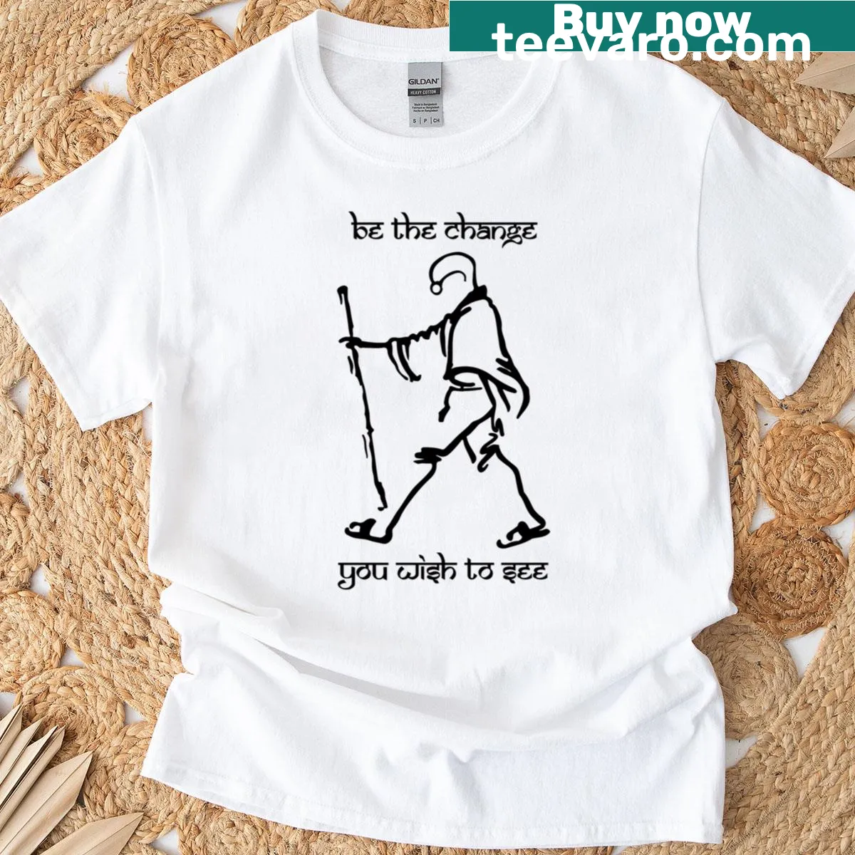 Inspirational Gandhi quote t-shirt emphasizing positive change — on a men's t-shirt