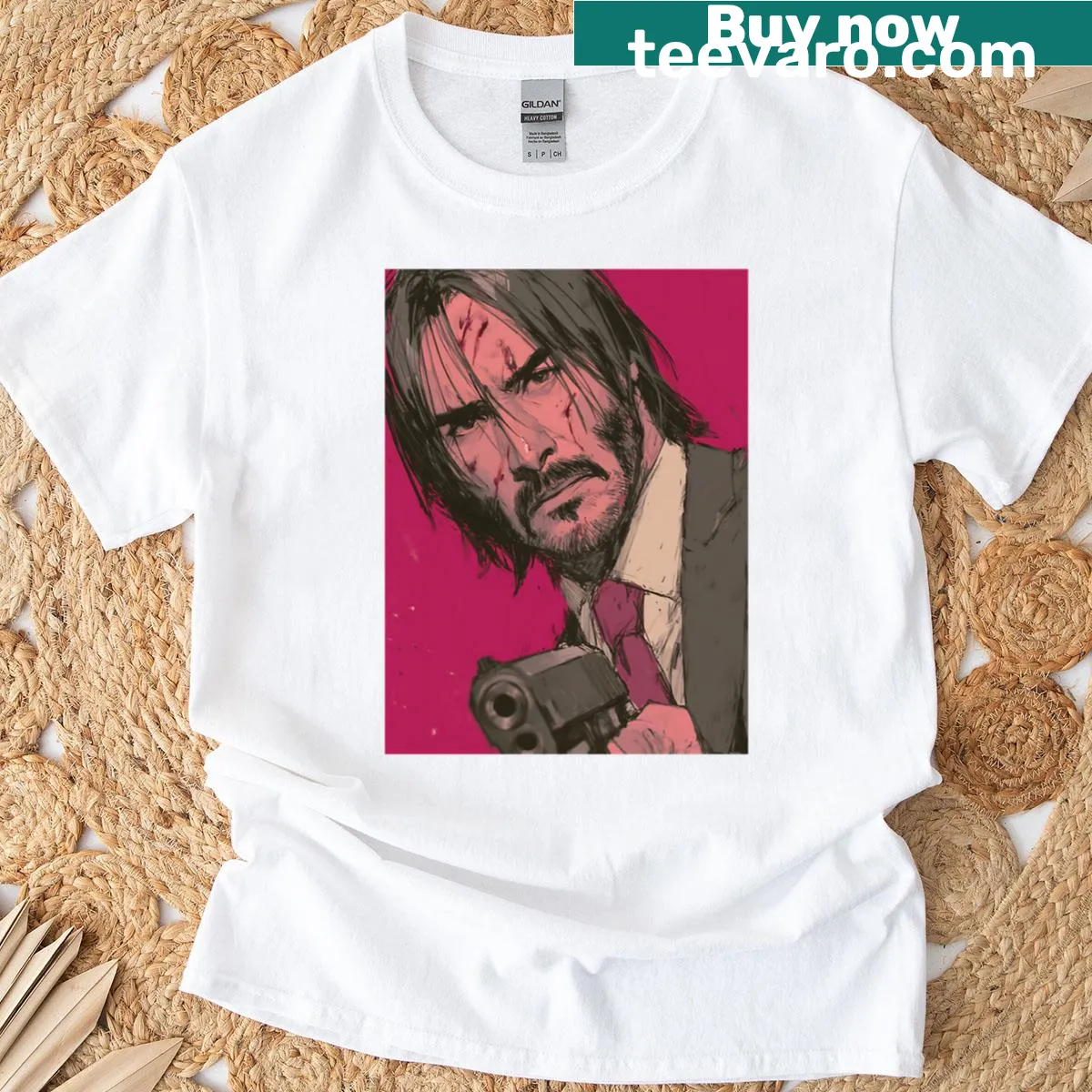 T-shirt featuring a bold portrait of John Wick with his gun — on a men's t-shirt
