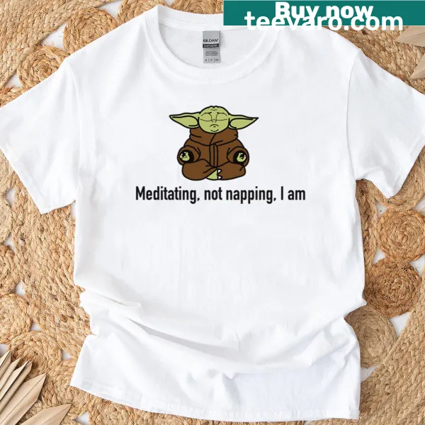 Funny typography t-shirt with 'Meditating Not Napping' text