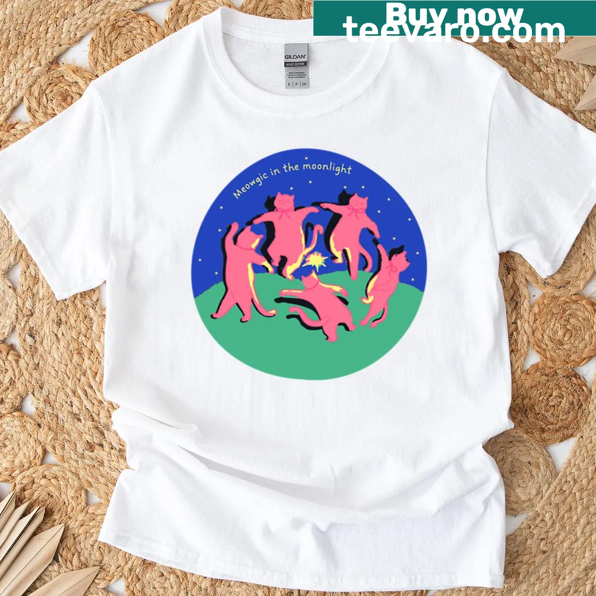 Whimsical cat design in moonlight on the Meowgic t-shirt — on a men's t-shirt